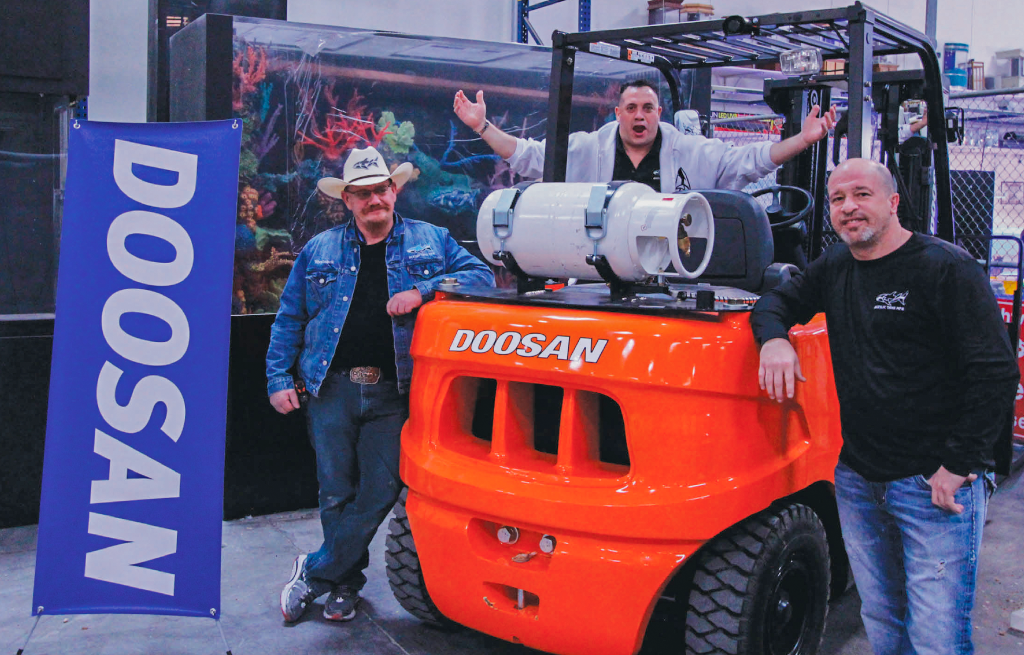 happy customers by a doosan forklift
